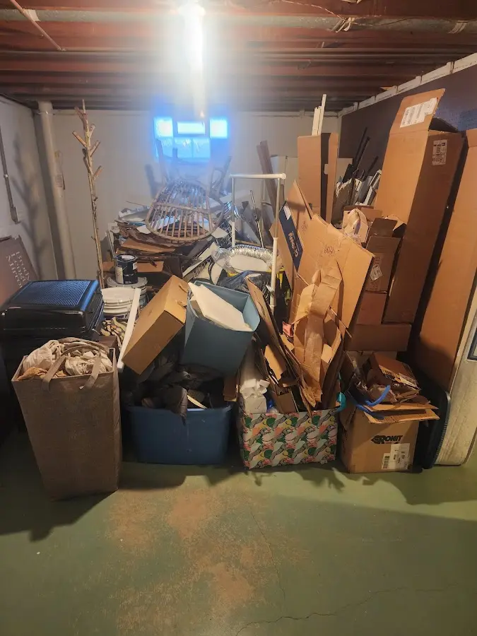 Roll-off dumpster container at job site for Yard Waste Dumpster Rental in Hazlet